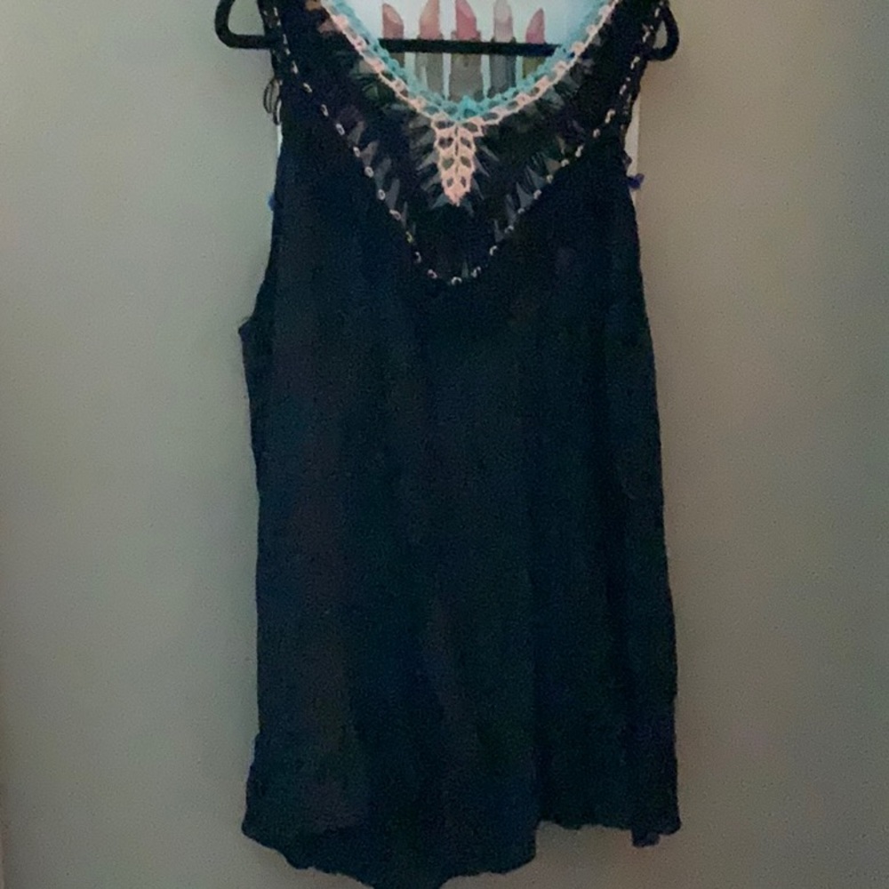 Bathing suit cover-up size 3X but runs small